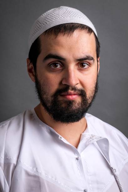 istock Serious muslim young man looking at the camera 1341541358