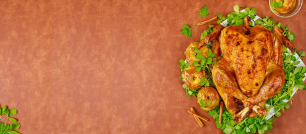 istock Roasted turkey garnished with caramel apples and clover leaves. 1341541710