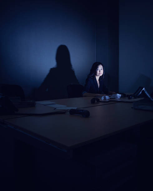 istock Lonely japanese female manager at her desk 1341546408