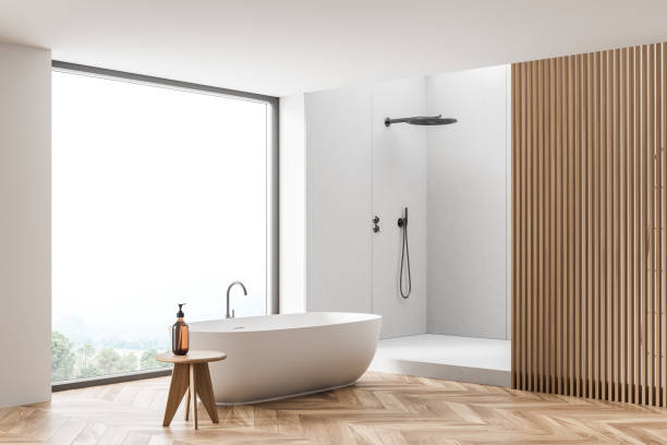 istock Corner of white bathroom with wall panelling 1341547626