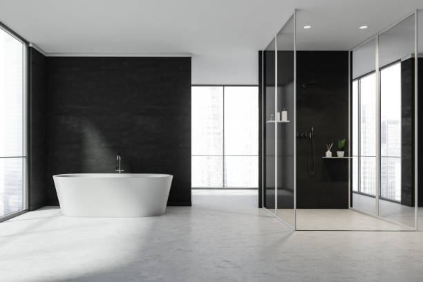 istock White panoramic bathroom space with shower, black partition walls 1341547669