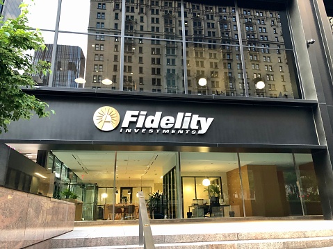 New York City, New York United States - August 29 2021: Fidelity Investments bank brokerage firm corporate logo sign advertisement near Times Square.