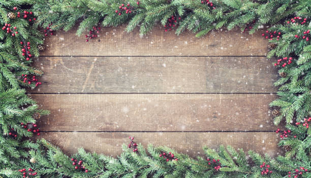 istock Christmas Garland Frame on Wood 1341548807