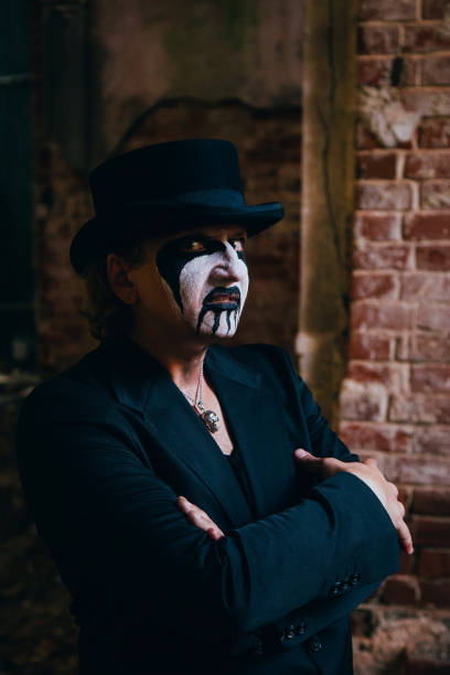 istock Frightening man with horrible Halloween makeup. Horror theme 1341554551