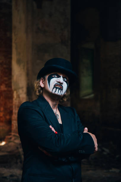 istock Frightening man with horrible Halloween makeup. Horror theme 1341554589
