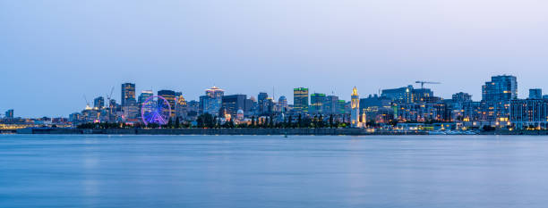 Montreal city skyline and Saint Lawrence River at dusk stock photo