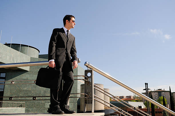 istock Young businessman holding a briefcase 134156463