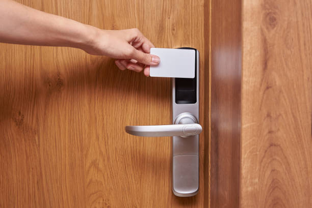 istock Hand open door digital lock with card key 1341569602