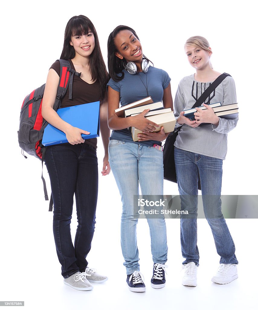 Adolescents heureux étudiant ethnique filles dans le domaine de l'éducation - Photo de Fond blanc libre de droits