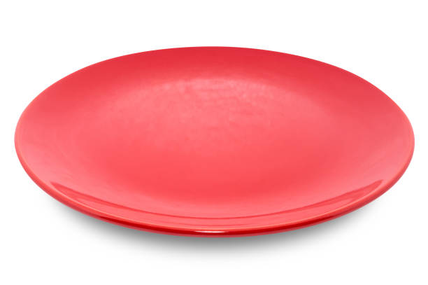 istock Red circle ceramics plate isolated on white background. 1341577084