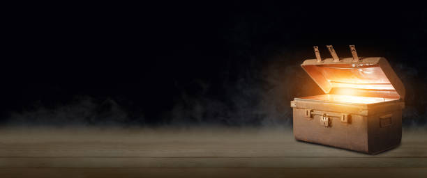 istock Open the glowing ancient treasure chest. 1341580062