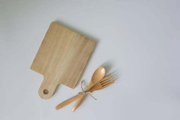 istock Wooden kitchen ware chopping board tray isolated on white background. table ware cooking view from top for food decoration and packaging design 1341580953