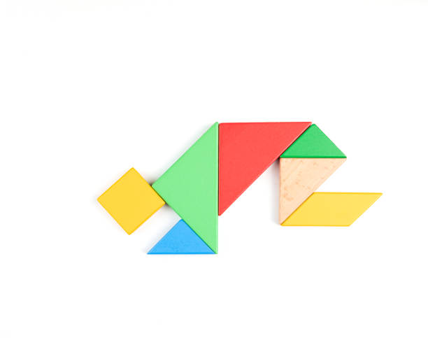 istock Tangram Puzzle Kneeling Men on White Background 1341581833