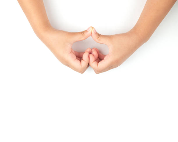 istock Child Making Heart Shape Gesture on White Background 1341585531