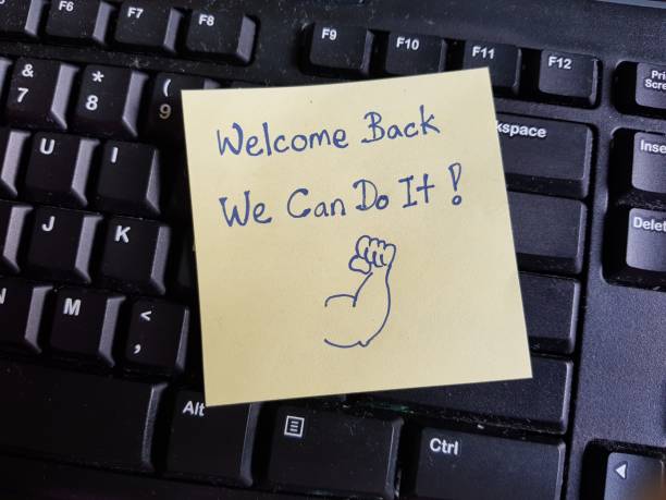istock Together we can do it. Back to office concept. Return to workplace during covid-19 pandemic. Teamwork. 1341587110