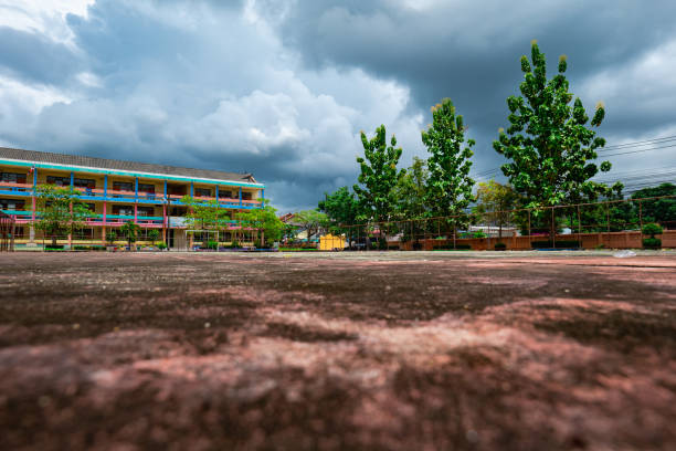 Calgary, Alberta, Canada. Jun 20, 2025. St. Elizabeth Seton School in Calgary stands under a dynamic sky, its modern architecture and vibrant colors a beacon for learning and community.