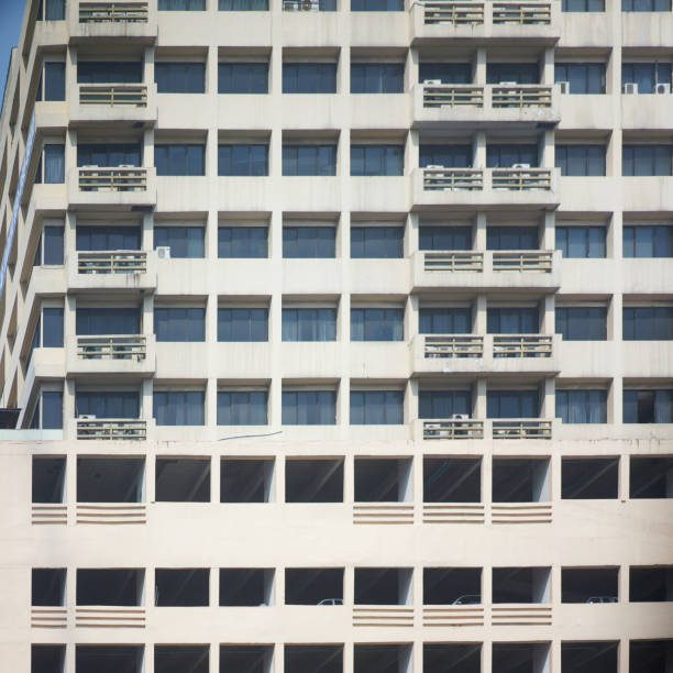 istock condominium tall sky scraper in dawn or sunset time 1341589625