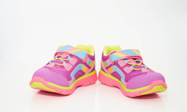istock color kid  sneakers shoes on floor front view soft focus 1341589653