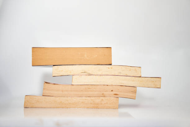 istock stacks of books on white background high angle view 1341589654