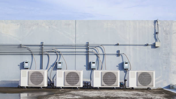 istock air condition outdoor unit compressor install outside the building. 1341590427