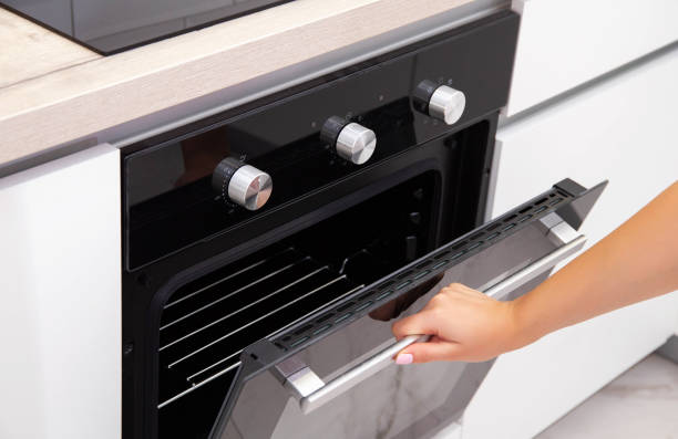 istock Modern oven with catalytic cleaning and grill built into the kitchen. Close-up 1341594140
