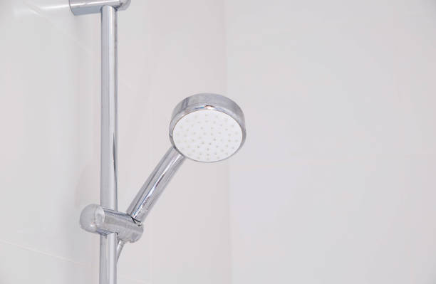 istock Modern chrome rain shower in the bathroom on a white wall, close-up. Copy space for text 1341594153