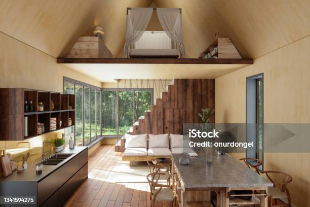 Tiny House Interior With Sofa Kitchen Dining Table Bedroom And Garden View From The Window Stock Photo - Download Image Now