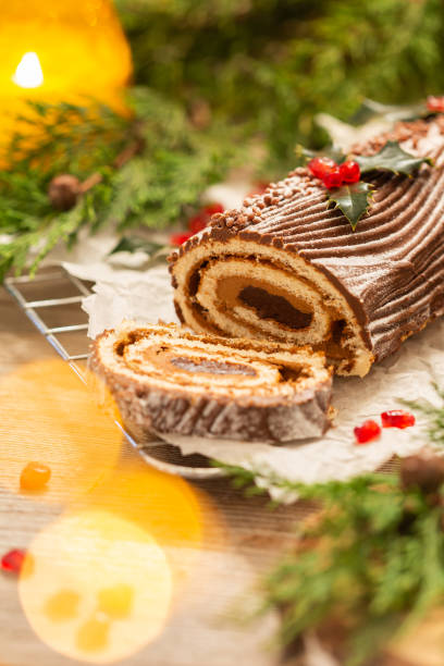 istock Traditional Christmas cake, chocolate Yule log with festive decorations 1341594366