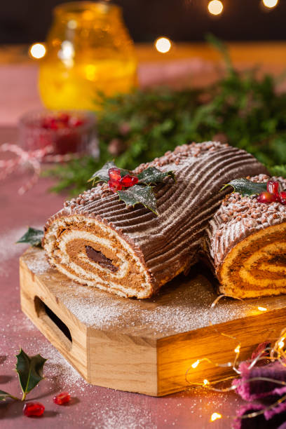 istock Traditional Christmas cake, chocolate Yule log with festive decorations 1341595031