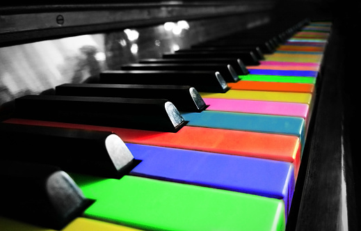 Colorful piano with painted keys. Artistic edit of the photo. Slovakia