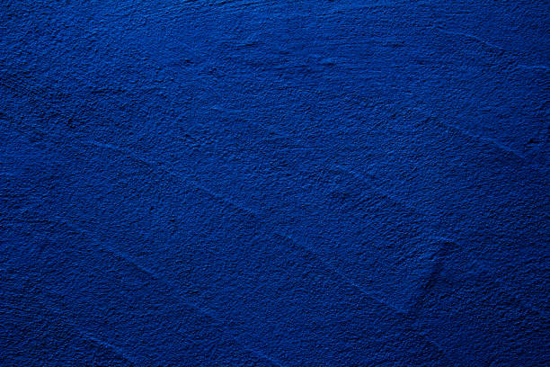 blue colored abstract wall background with textures of different shades of blue - royal blue imagens e fotografias de stock