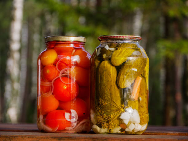 istock Canned Tomatoes And Pickled Cucumbers. 1341608032