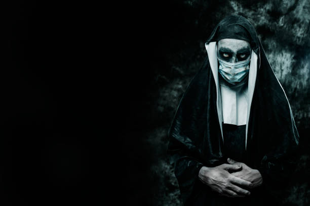 istock scary evil nun wearing a disposable face mask 1341610994