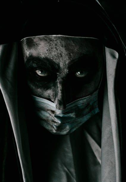 istock scary evil nun wears a dirty face mask 1341611034