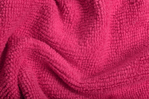 istock Close up of pink knitted textured background. 1341613263