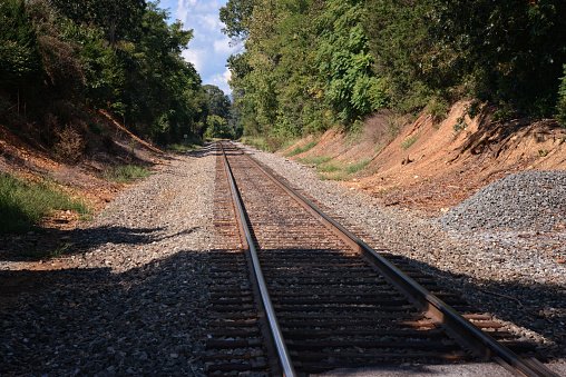 Railroad tracks in a rural area.