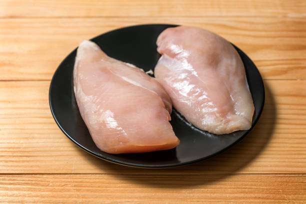 istock Chicken fillet in a black plate 1341616368