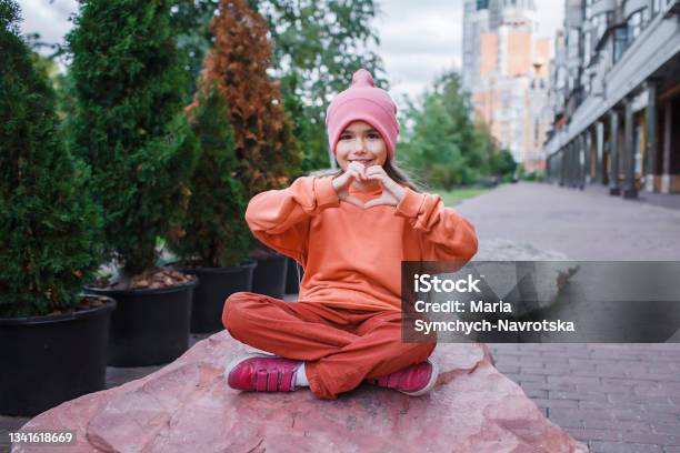 Girl In Trendy Hats And Hoodie Having Fun In Park Fall Vibes Autumn Beauty  Style Child Fashion Stock Photo - Download Image Now - iStock