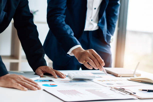 istock Business team meeting to conference, collaboration discussing working analyzing with financial data and marketing business strategy project, presentation and brainstorming to making profit of company 1341620368