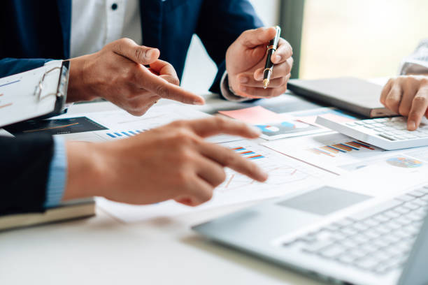 istock Business team meeting to conference, collaboration discussing working analyzing with financial data and marketing business strategy project, presentation and brainstorming to making profit of company 1341621004