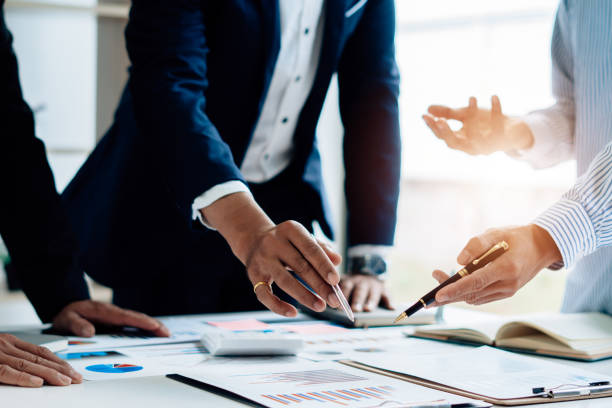 istock Business team meeting to conference, collaboration discussing working analyzing with financial data and marketing business strategy project, presentation and brainstorming to making profit of company 1341621803