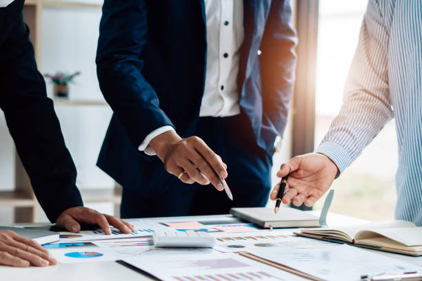 istock Business team meeting to conference, collaboration discussing working analyzing with financial data and marketing business strategy project, presentation and brainstorming to making profit of company 1341622526
