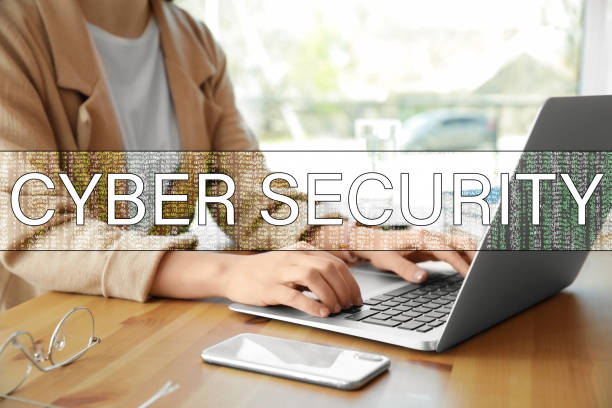 istock Cyber security concept. Woman working with laptop at table indoors, closeup 1341622792