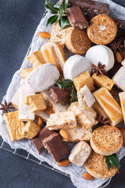 istock Typical Spanish Christmas sweets, shortbread mantecados, polvorones, nougat or turron 1341624621