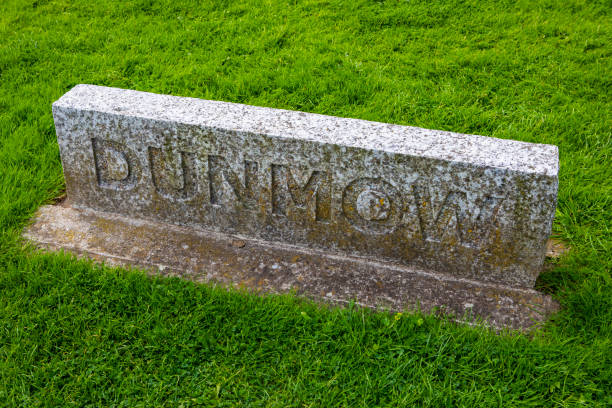 Dunmow stone Sign in Essex, UK Stone sign for Dunmow in Essex, UK. braintree essex photos stock pictures, royalty-free photos & images