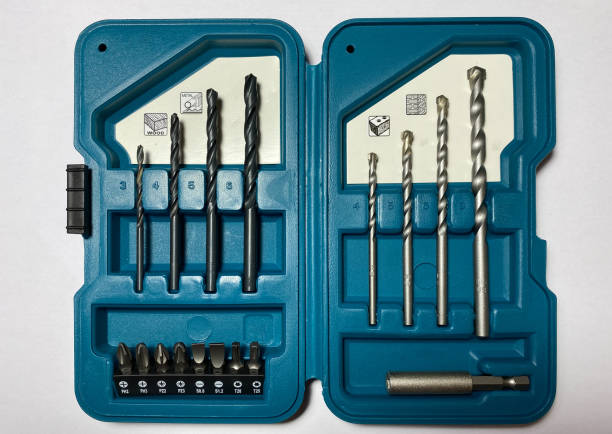 a set of bits and drills for wood, metal and brick in a beautiful box - drill bit fotos imagens e fotografias de stock