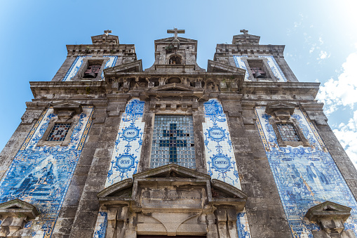 porto, portugal. 10th august, 2021: saint ildefonso is a famous blue tiled church located at porto old town