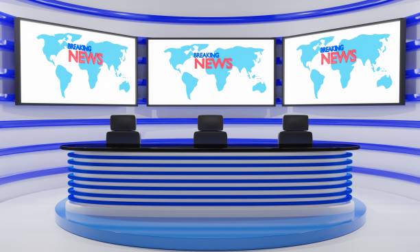 istock white table and lcd background in a news studio room.3d rendering. 1341629026