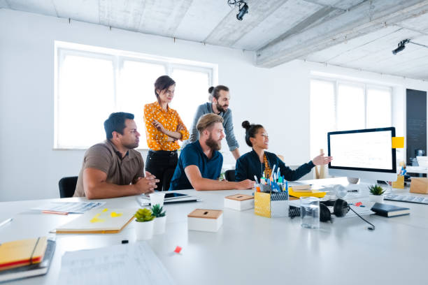 istock Business professionals working at new office desk 1341632142