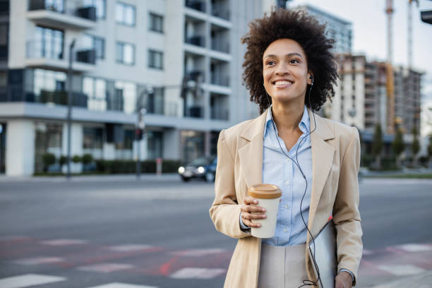 istock Well dressed woman  walking on the street after work 1341633043
